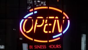 a lighted sign with a word on it
